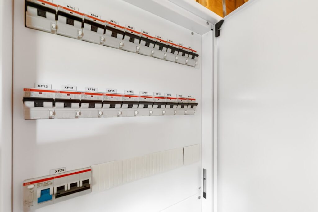 Consequences of Electrical Work Without a Permit in New York 2 electrical panel with stop work order permit notice residential home - consequences of electrical work without a permit
